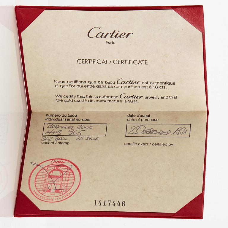 Cartier armring 18K guld med runda briljantslipade diamanter.