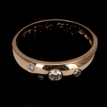 RING, guld 18K med briljantslipade diamanter ca. 0,15 ct. Finska stämplar 2000. Vikt 4,2 g.