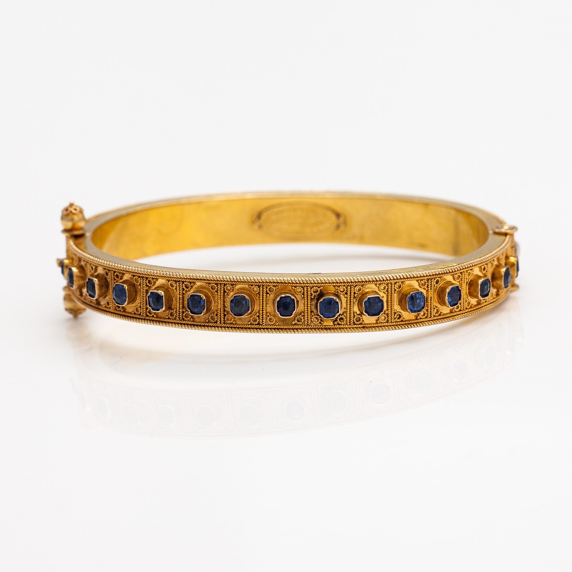 A ca. 22K gold bracelet with sapphires and pearls. Marchesini, Firenze Roma.