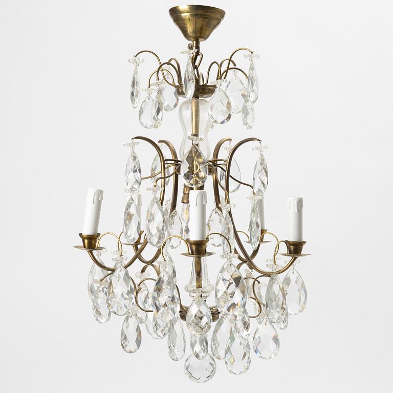 Takkrona, barockstil, 1900-talets första hälft.