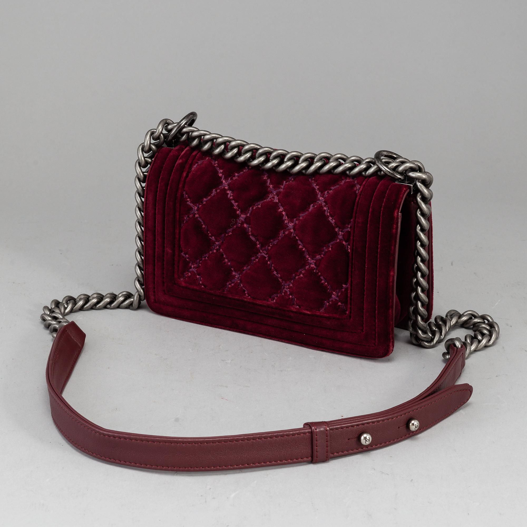 CHANEL, a burgundy quilted velvet 'Small Boy Bag'.