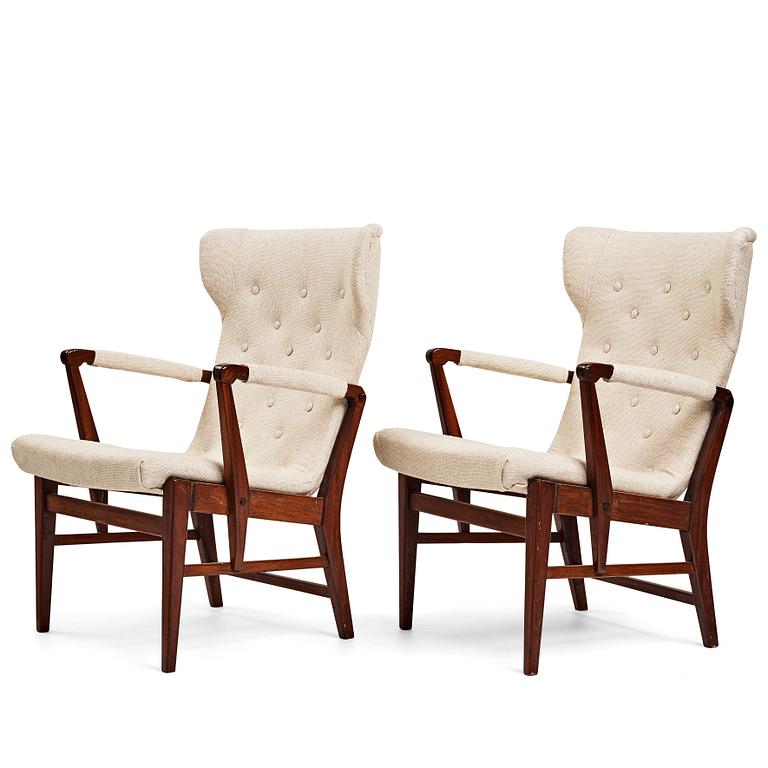 Bertil Söderberg, a pair of mahogany Swedish Modern easy chairs, Nordiska Kompaniet, 1940's.