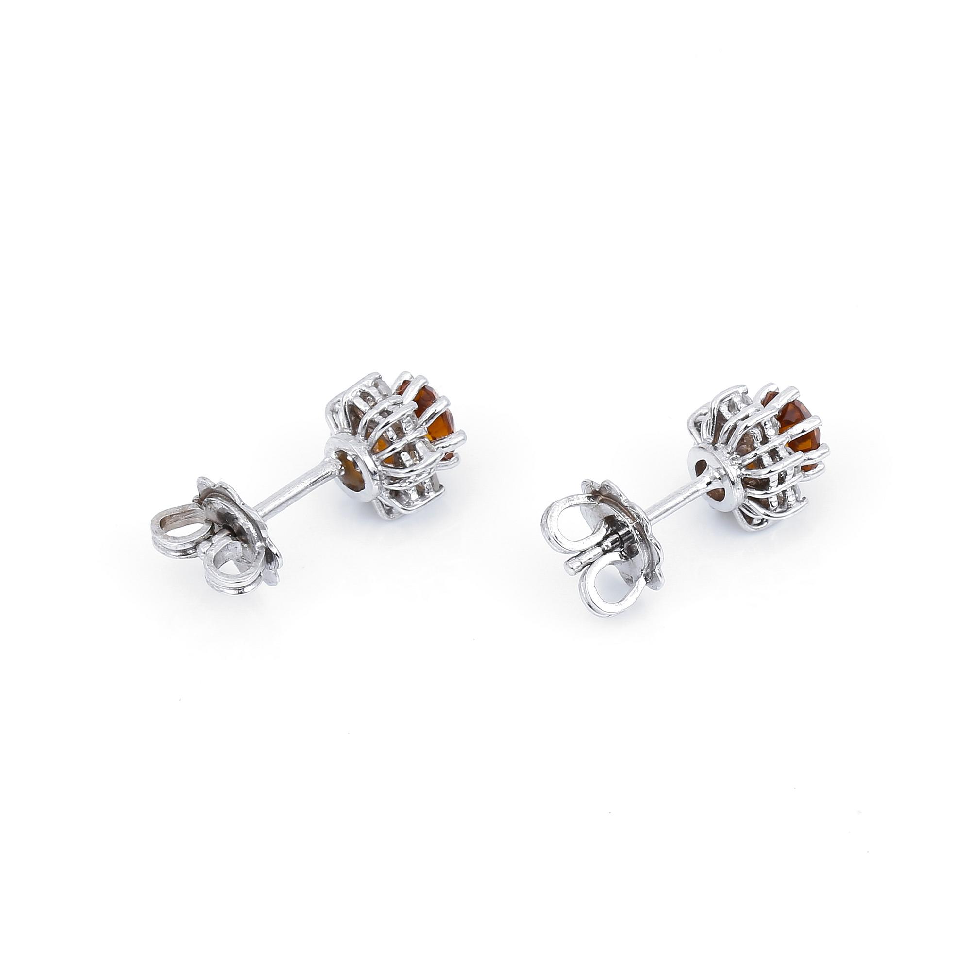 ÖRHÄNGEN, ett par, 14K vitguld med citriner tot ca 0,77 ct och diamanter tot ca 0,30 ct. vikt 2,75 g.