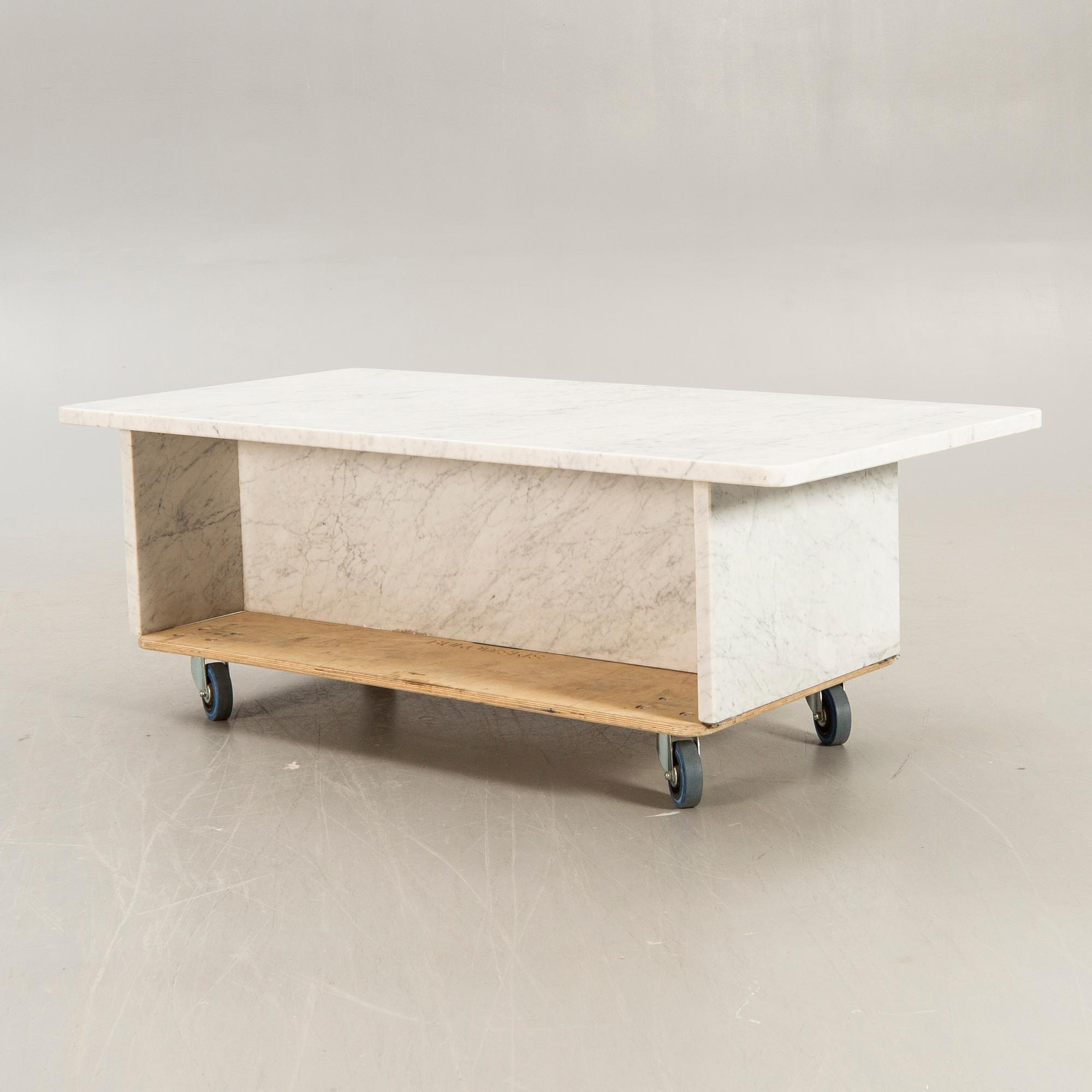 A marble coffee table later part of the 20th century.