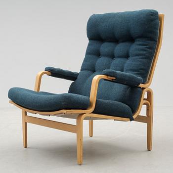 FÅTÖLJ, "Ingrid", Bruno Mathsson, DUX. 1900-talets andra hälft.