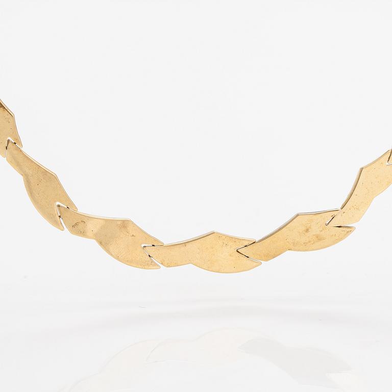 A 14K gold necklace and bracelet.