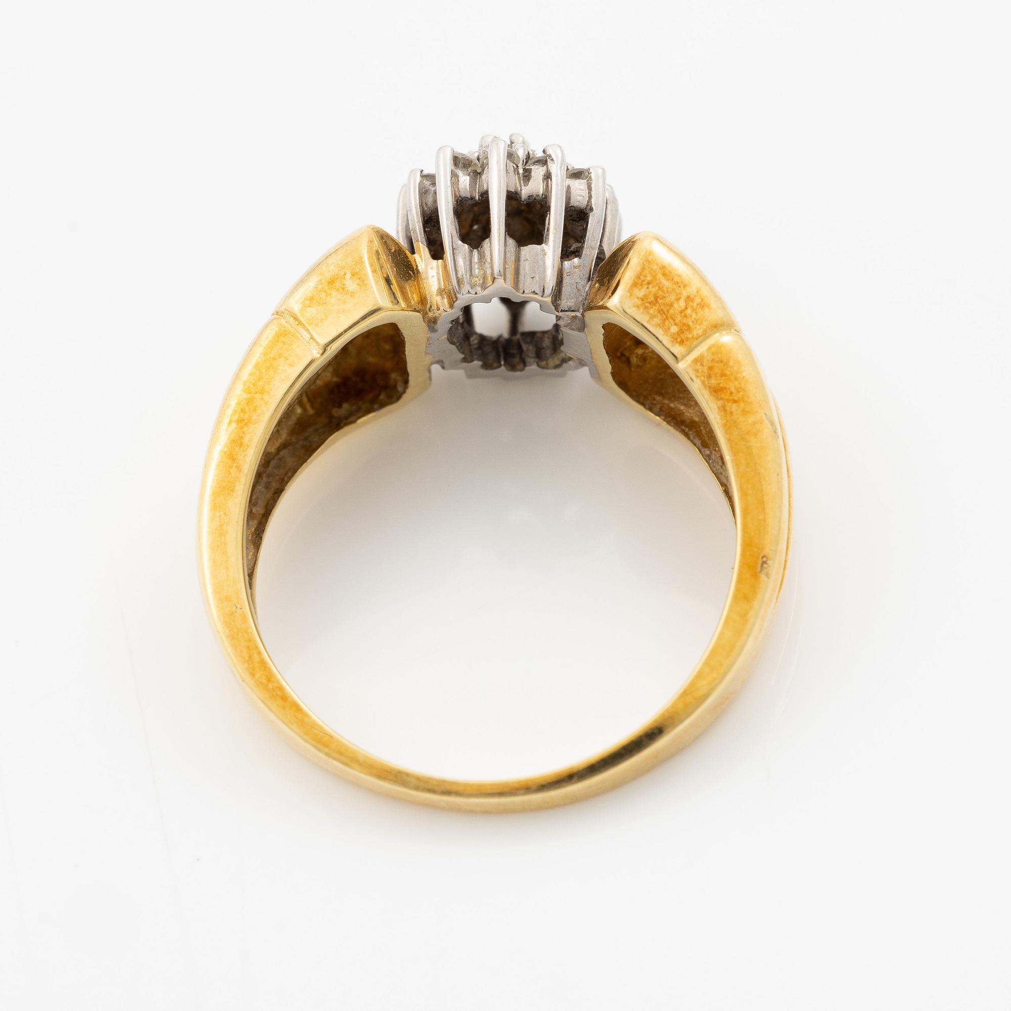 18K gold ring with diamonds.