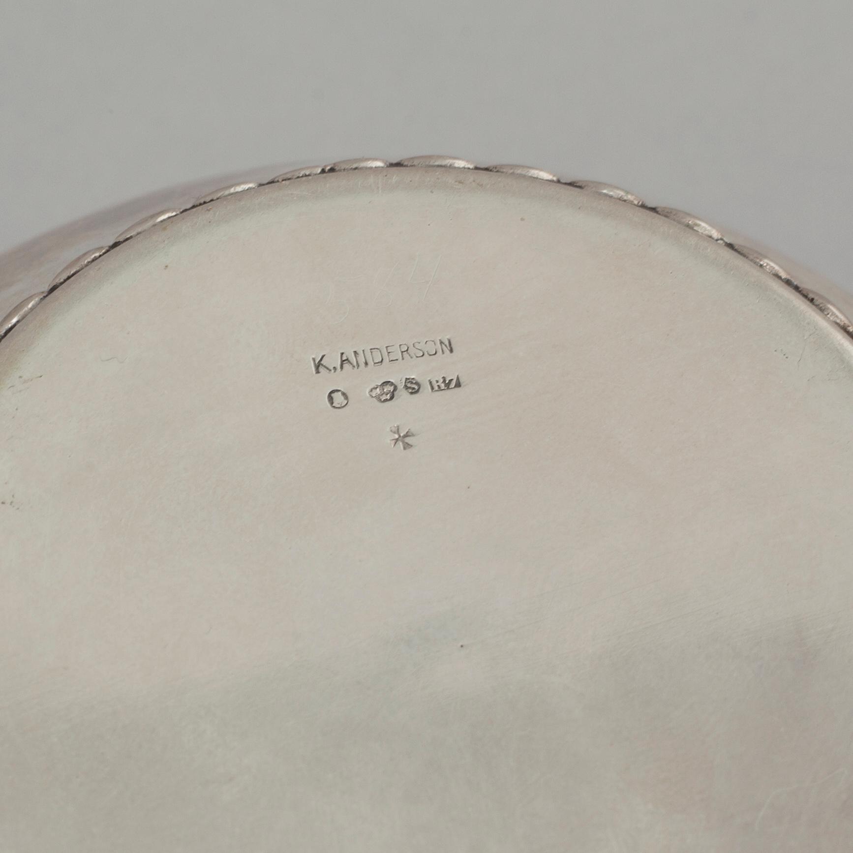 A bowl, a grate bowl and a bowl with lid in silver, first half of the 20th cenutry. Weight 600 g exkl inner glass bowl.