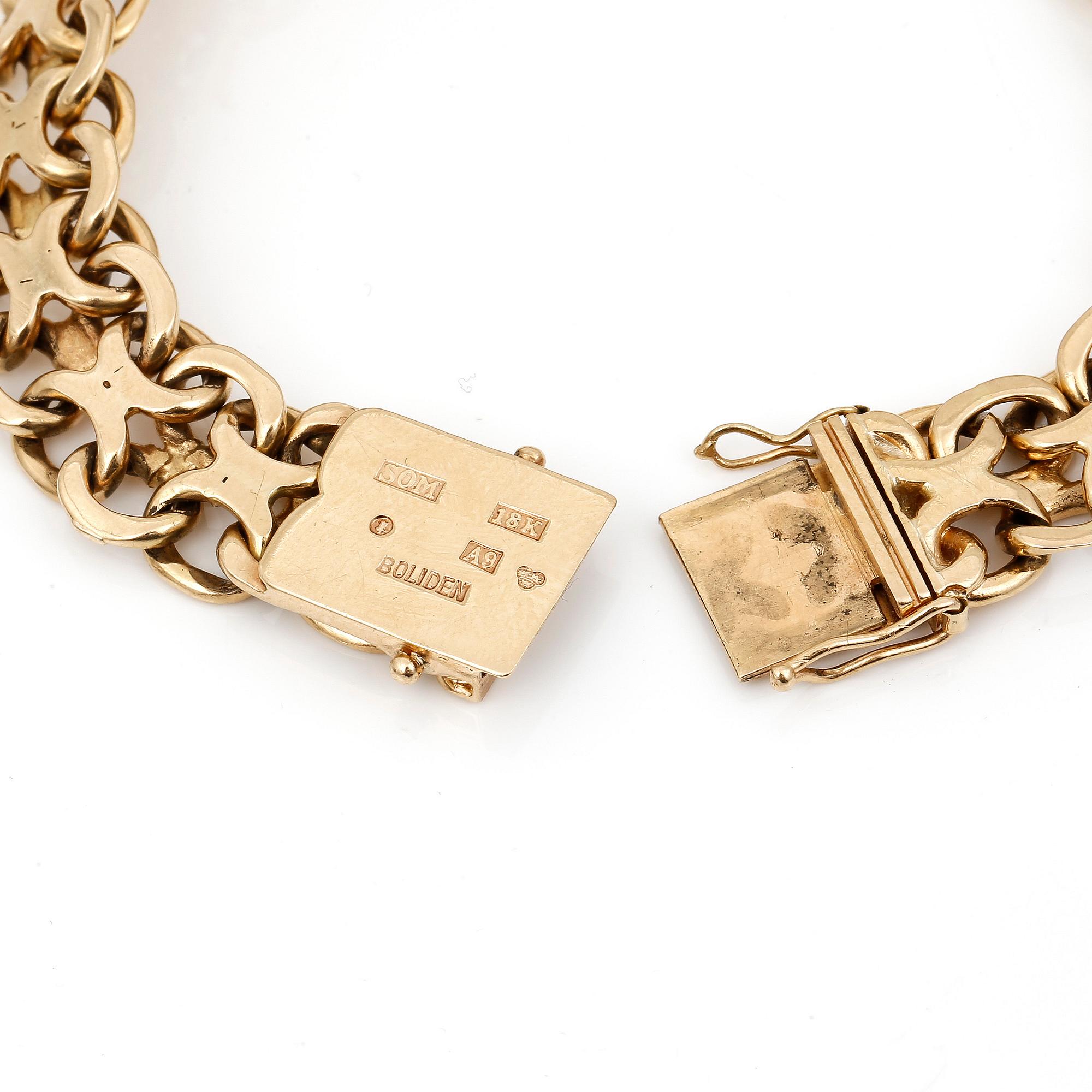 ARMLÄNK, 18K guld, Matsson för Boliden, Stockholm, 1951. Total vikt 42,46 g.