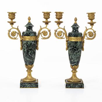 A pair of candelabras, around 1900.