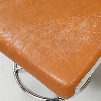 A pair of armchair and foot stools from Ikea, made in the fourth quarter of the 20th century.