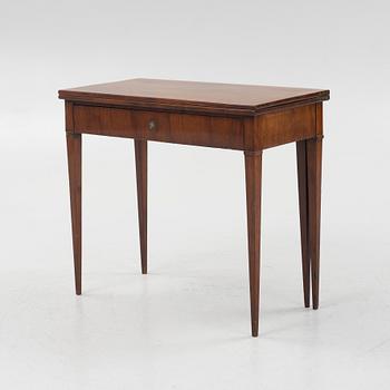 A late Gustavian mahogany games table, circa 1800.