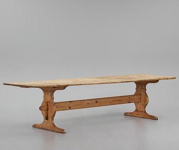 A pine trestle table, 20th century incorporating older elements.