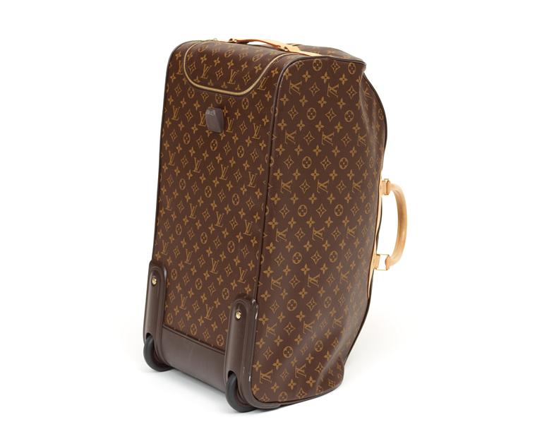 A monogram canvas roll bag by Louis Vuitton, "Eole 60 Monogram".