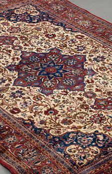 A RUG, semi-antique silk Kashan, ca 200 x 129 cm.