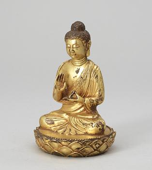 52. A gilt bronze Buddha, late Qing dynasty.