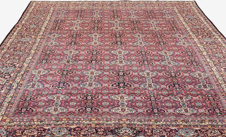 A semi-antique Semnan carpet, North Persia, c. 412 x 304 cm.