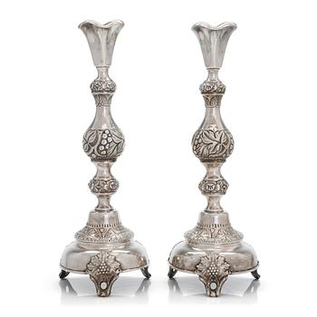 A pair of silver candlesticks from Warsaw, 1880s-90s. Unidentified Cyrillic maker mark FG.