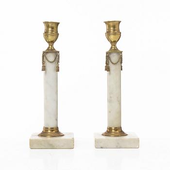 A pair of late Gustavian candlesticks from around the year 1800.