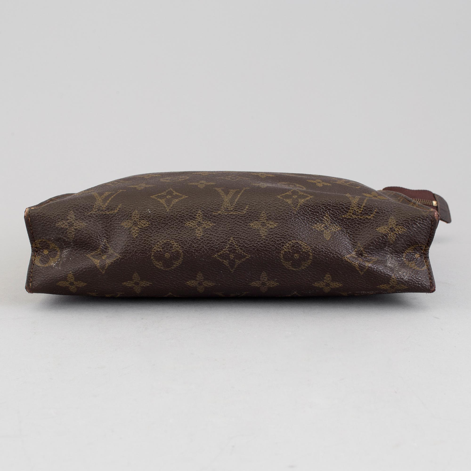 LOUIS VUITTON, a monogram canvas make up bag.