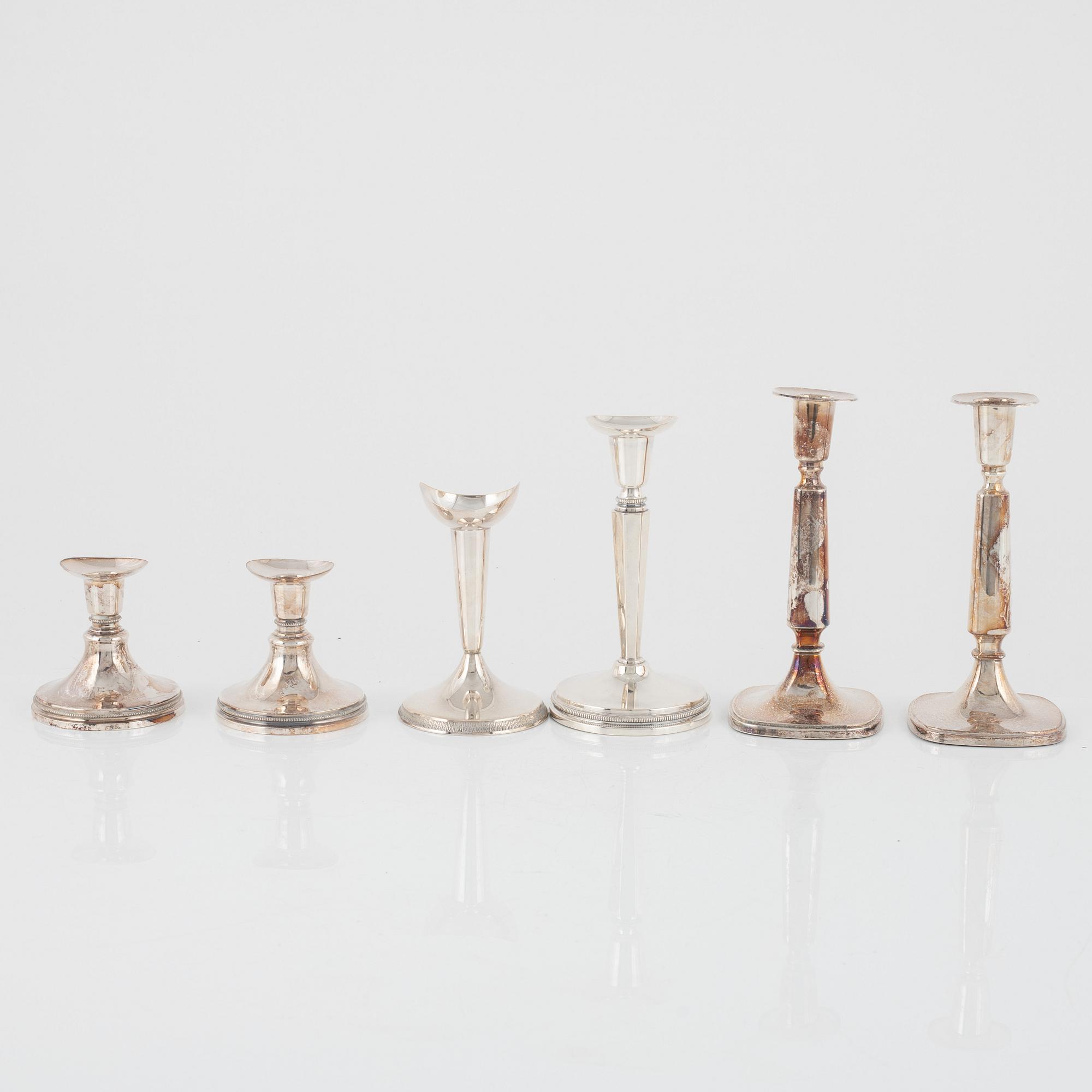 Candlesticks, silver, two pairs and two odd ones, MGAB, GAB, and Ceson Guldvaru Ab, Sweden, 1957-1981.