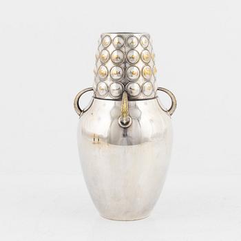 A pair of white metal candle holders, and a silver-plates vase, WMF, Germany, first half of the 20th century.