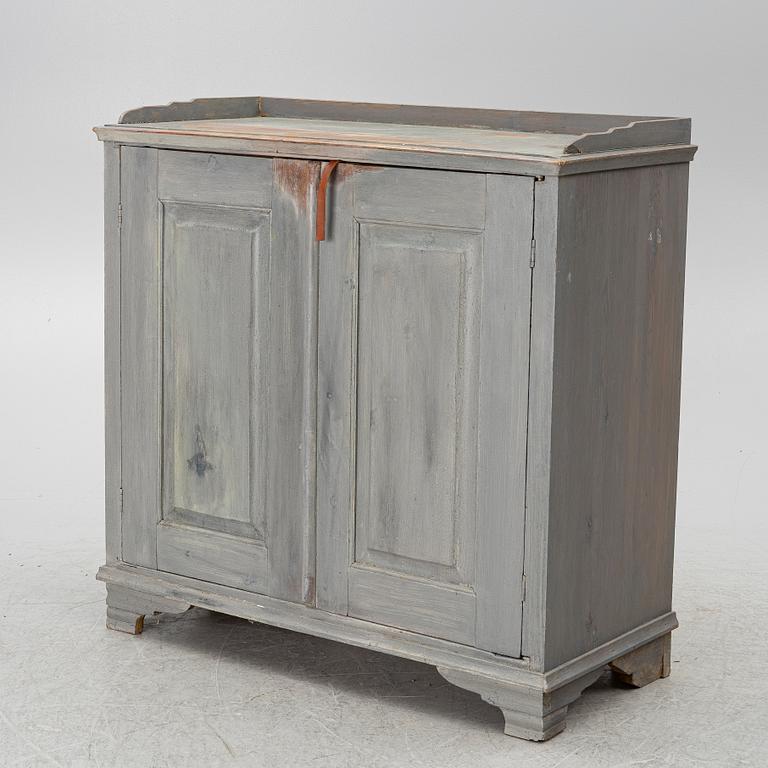 A Gustavian cupboard, circa 1800.