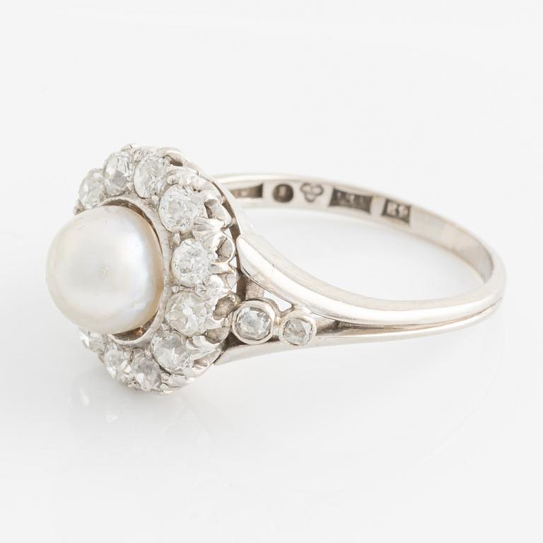 An 18K white gold ring set with a bouton pearl and old-cut diamonds.