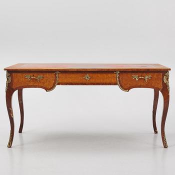 A Louis XV-style bureau plat desk, early 20th century.