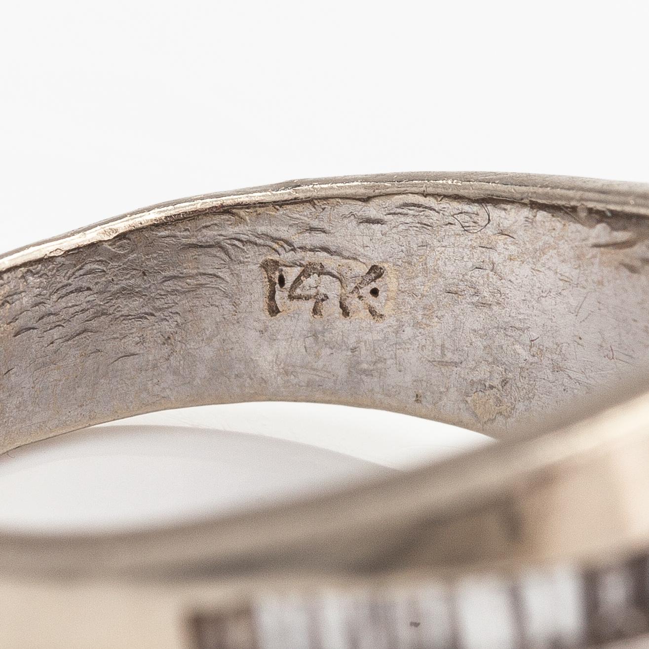 Ring, 14K vitguld, baguette- och princesslipade diamanter ca 1.90 ct tot.