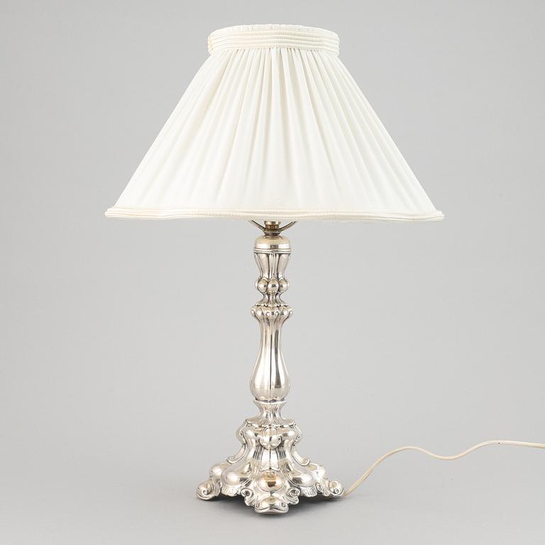 A silver plate neo-rococo tablelamp by CG Hallberg.