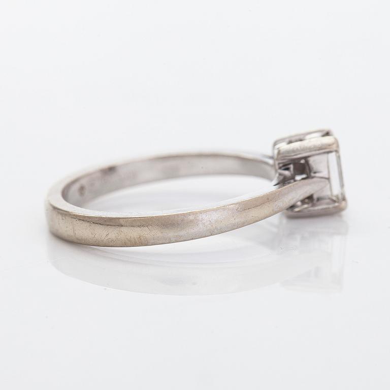 A 14K white gold ring, with an emerald-cut diamond ca. 0.50 ct according to  engraving.