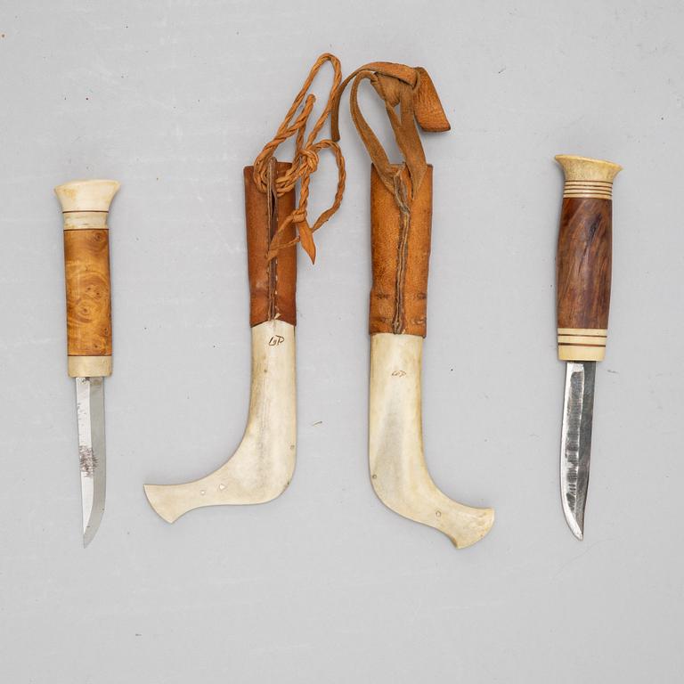 Lars Olov Parfa, two reindeer horn Sami knives, signed.