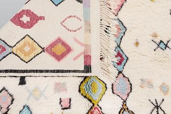 A Moroccan rug, approx. 253 x 166 cm.