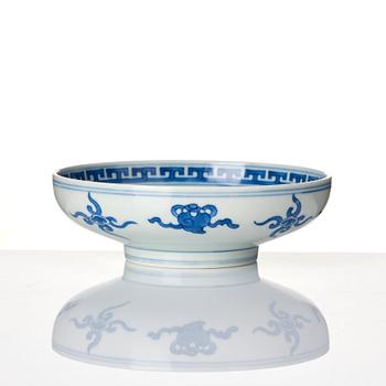 A blue and white heavily potted dish, Republic period with a mark.