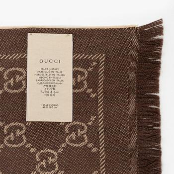 Gucci, a wool 'GG Jaquard Knitted Scarf'.