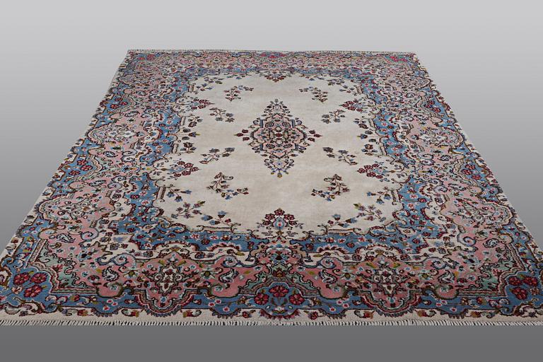 A carpet, Kirman, ca 280 x 213 cm.