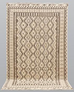 A carpet, Kilim, ca 305 x 198 cm.