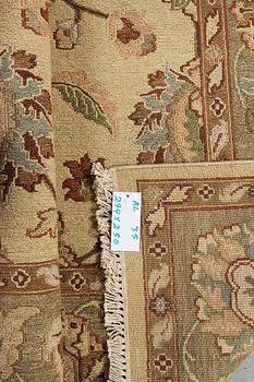 An oriental carpet with Mamluk design, c. 294 x 250 cm.