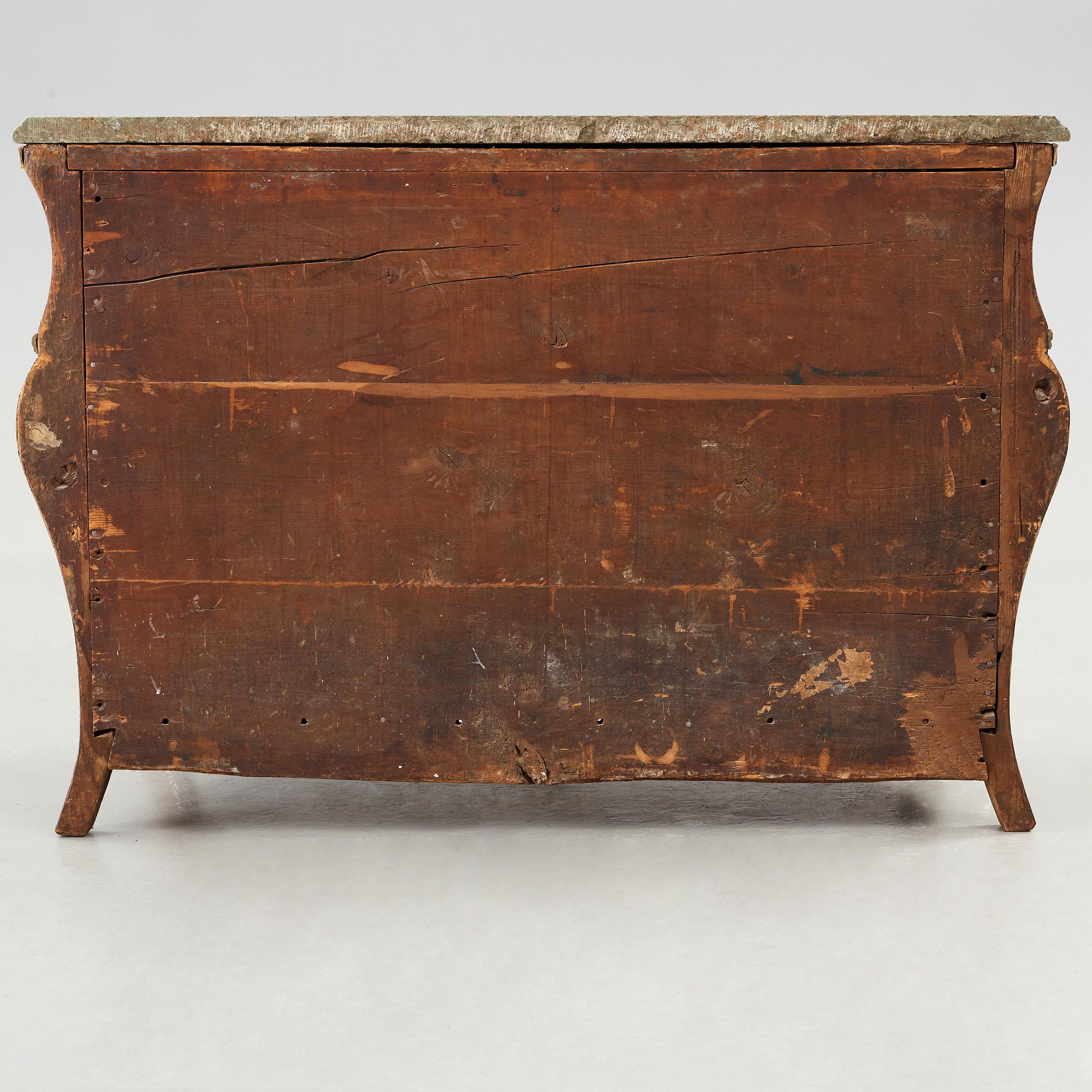 A Swedish Rococo chest of drawers by Christian Linning dated 1761 (master in Stockholm 1744-1779).