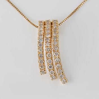 HÄNGE , 14K guld med briljantslipade diamanter ca 1.20 ct. Vikt 5,4 gram.