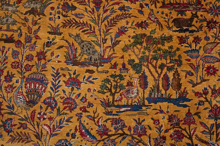 A carpet, a semi-antique silk Kashan figural, ca 309-310 x 204,5-207 cm.