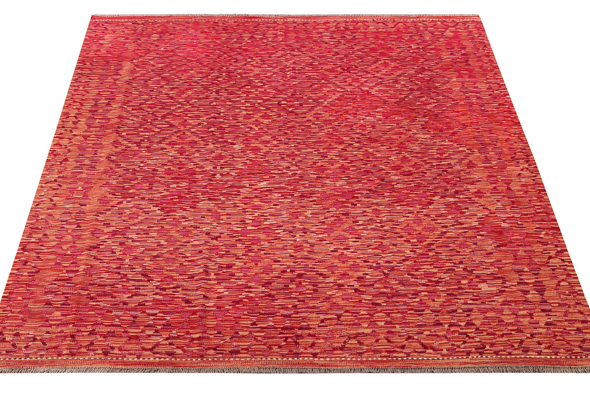 An Afghan Kelim carpet, c. 200 x 199 cm.