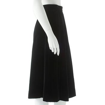 YVES SAINT LAURENT, a black velvet skirt.