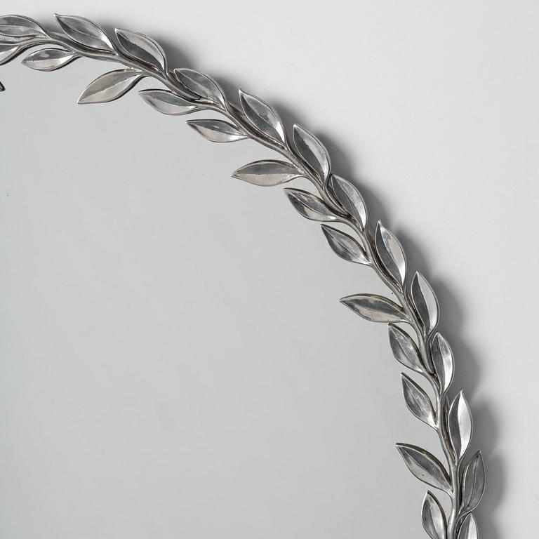 Estrid Ericson, a pewter framed mirror, model "A 2492", Svenskt Tenn, Stockholm, 1957.