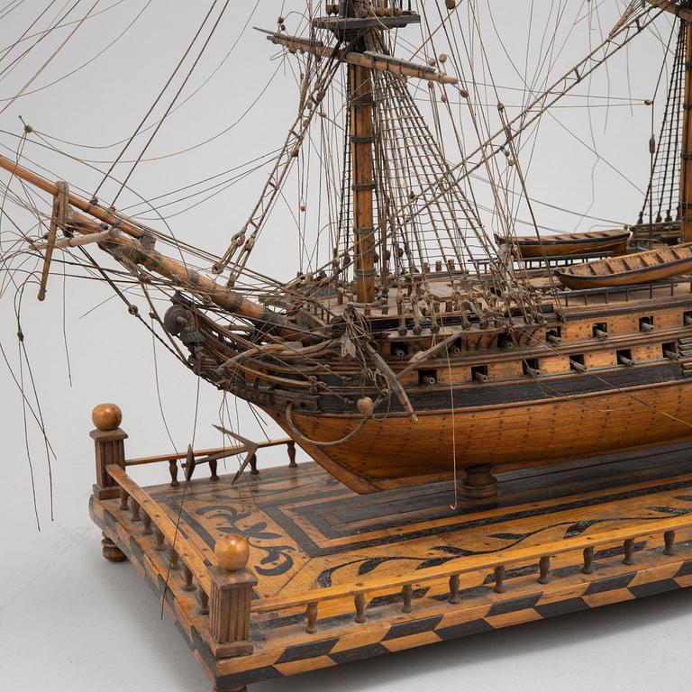 A 18th Century wooden ship model.