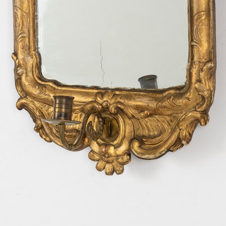 A Rococo mirror sconce, 18th Century.