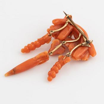 Carved coral brooch. Most likely Italy.