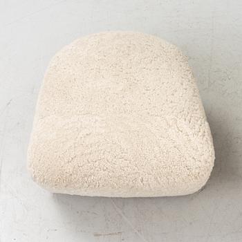 A 'The tired man' lounge chair with stool by Flemming Lassen by Lassen, designed 1935.