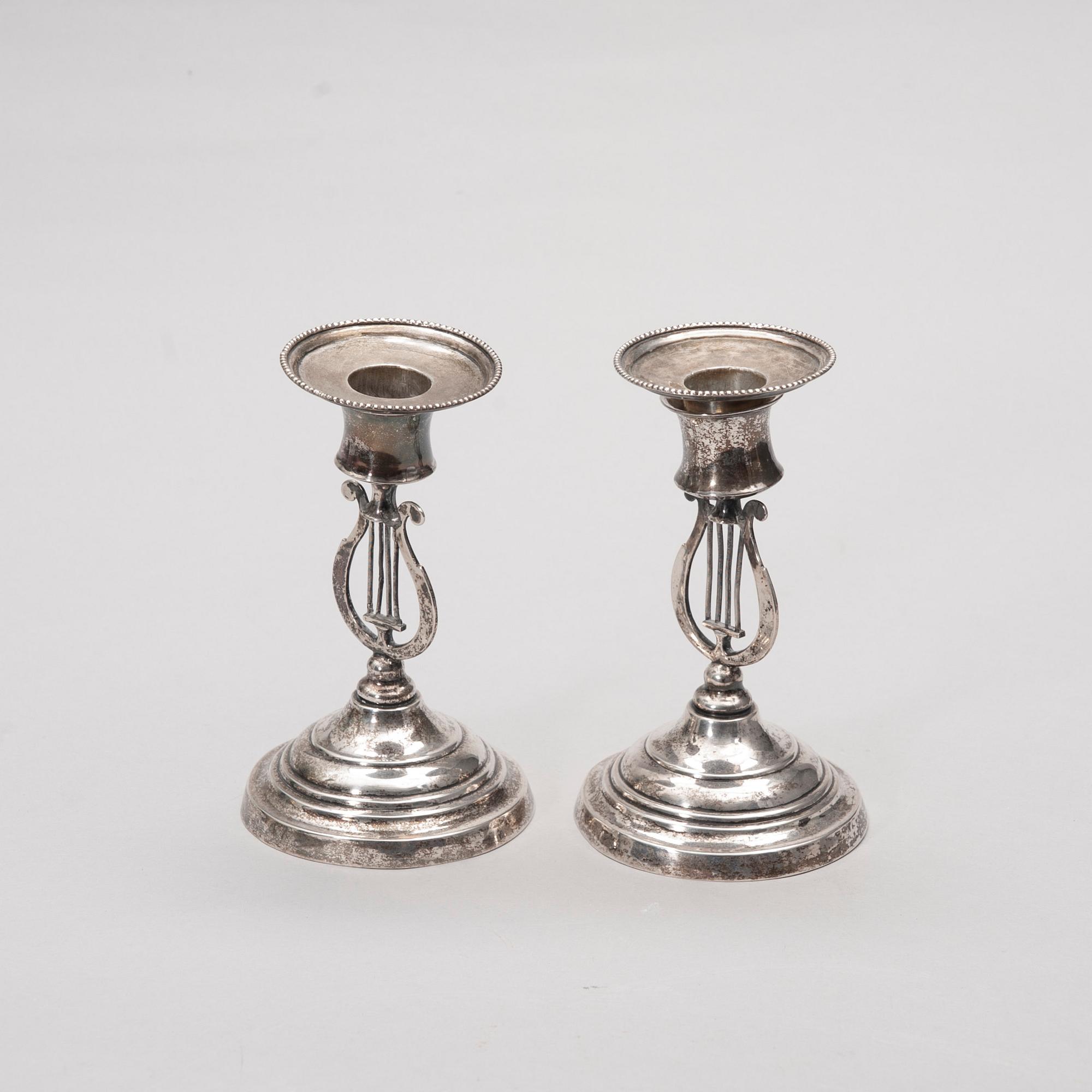 LJUSSTAKAR, ett par, silver, Jafet Knuuttinen (1857-1898), Kuopio 1860. Vikt 162,8 g.